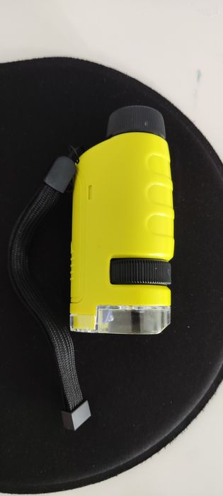 Microscópio de bolso novo