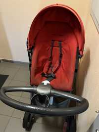 Коляска червона Stokke в повному комплекті