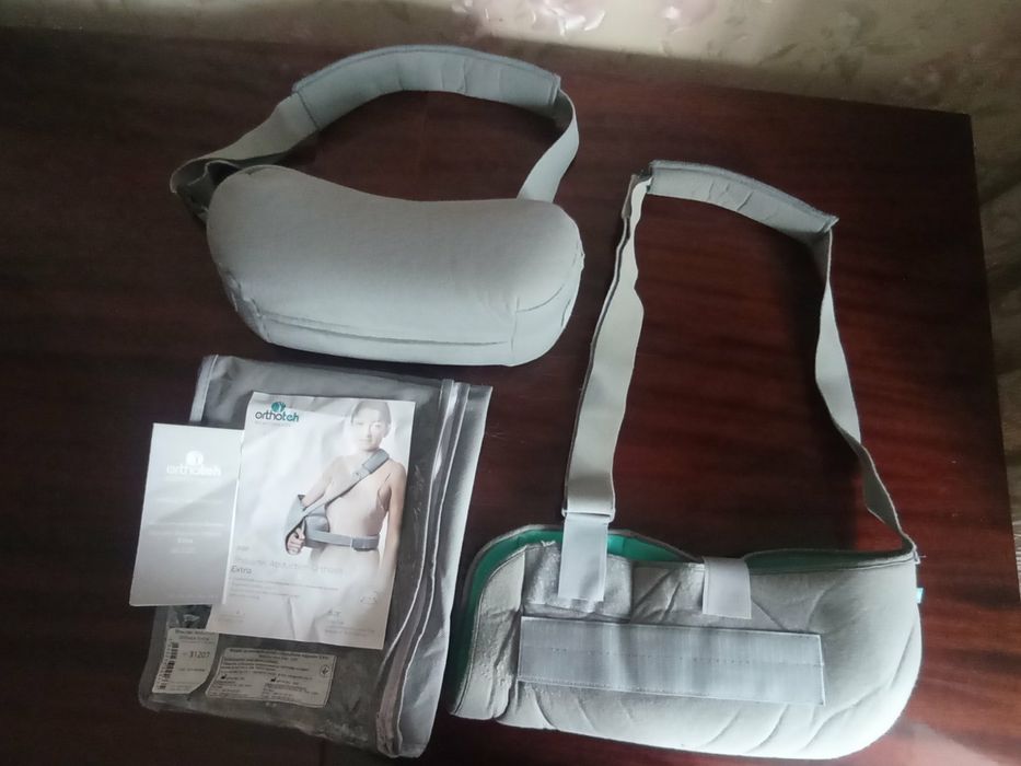 Фіксуюча пов'язка для відведення плеча