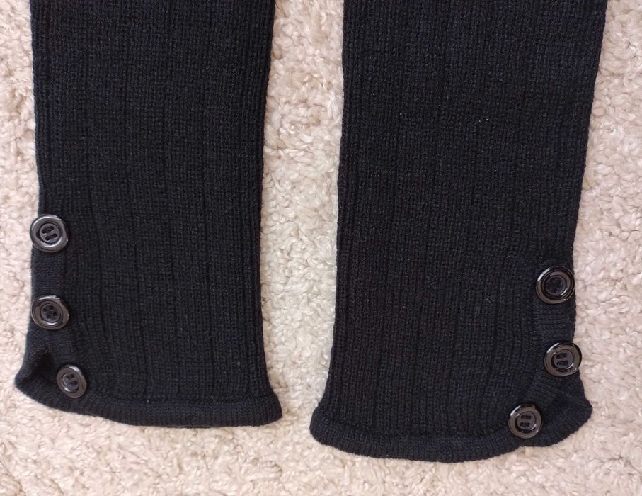 Nowe ocieplacze z guzikami na nogi, kolor Czarny.