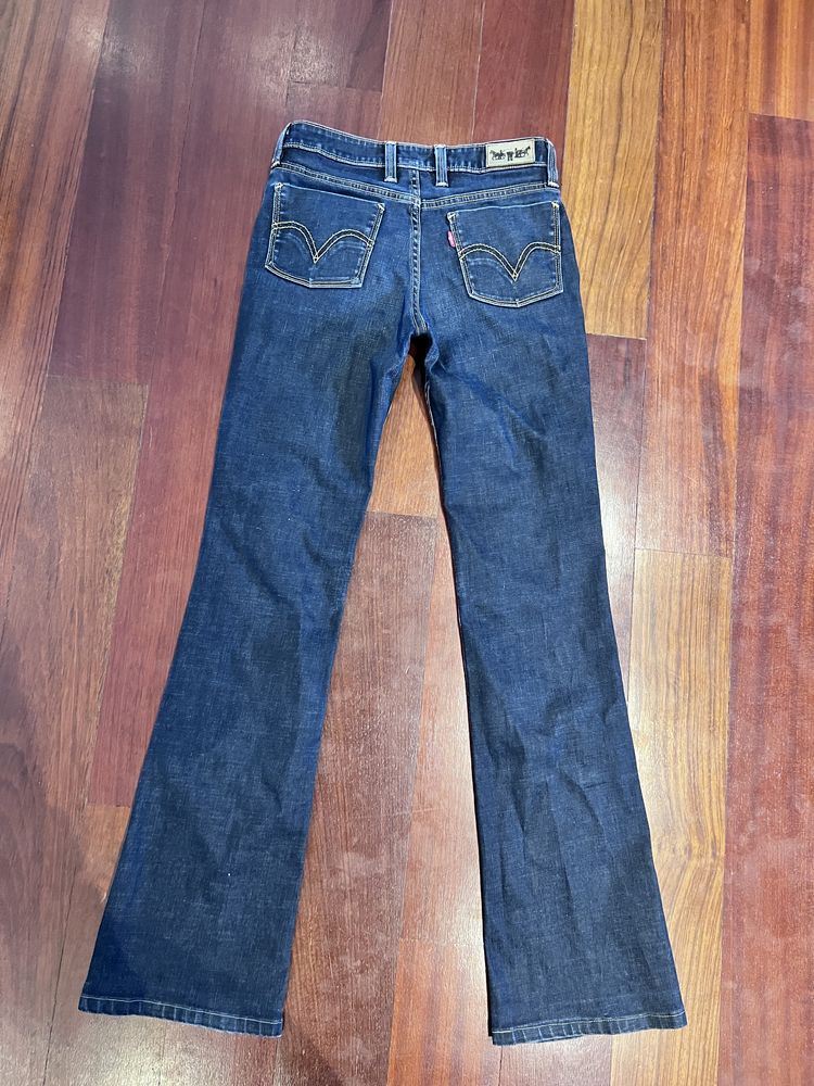 Levis dzwony damskie jeansy granatowe jak nowe 34 XS 28/34