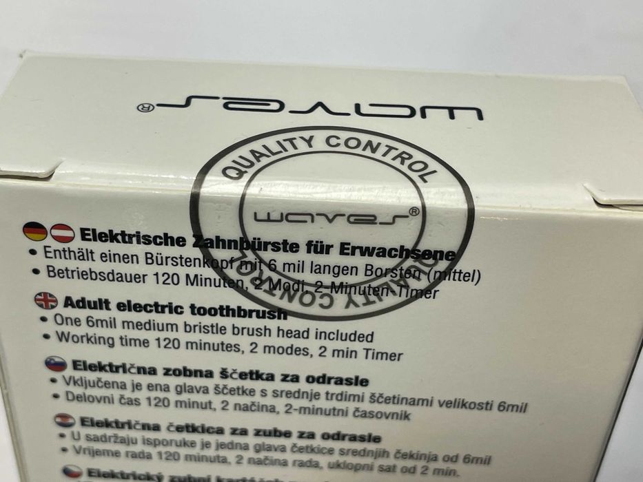 Elektryczna szczoteczka do zębów dla dorosłych biała