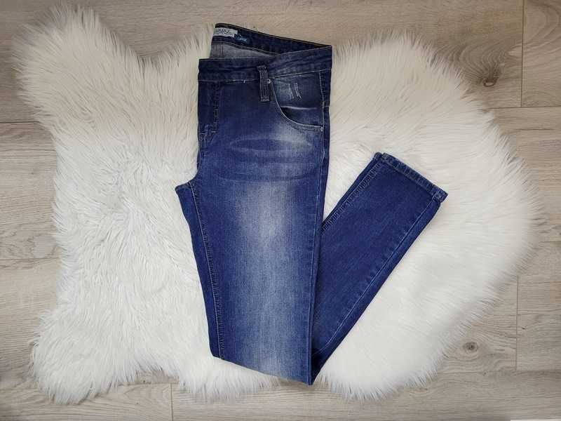 Niebieskie spodnie dżinsy rurki / skinny z przetarciami, L (40)