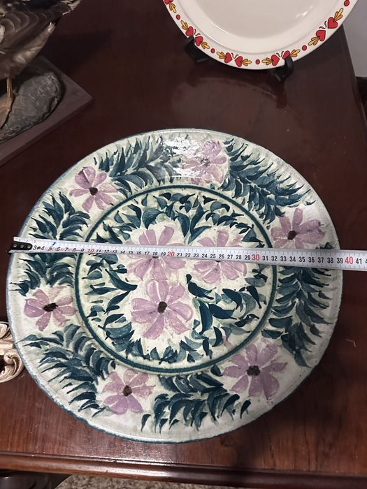 Prato decorativo em barro pintado