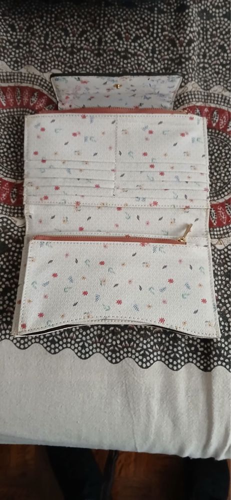 Mala e carteiras prafois