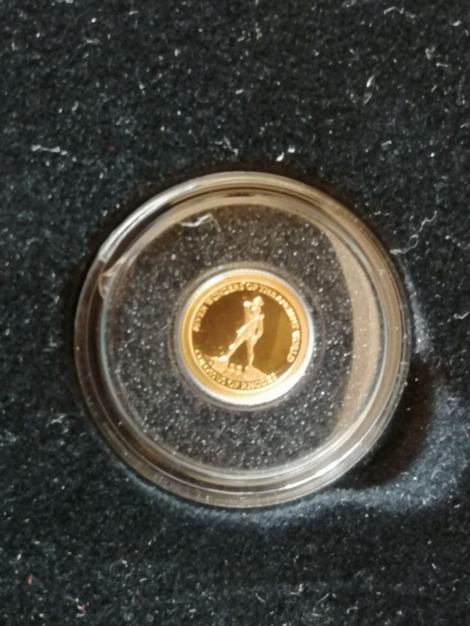 7 szt złotych monet z serii Najmniejsze Monety Świata