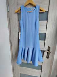 Błękitna sukienka z falbanką S