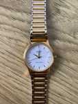 Casio MTP-1016 zegarek zloty biala tarcza wodoodporny