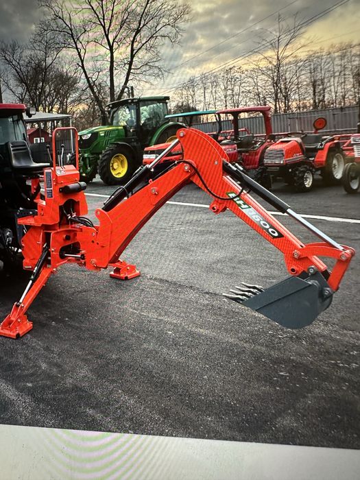 екскаватор причіпний