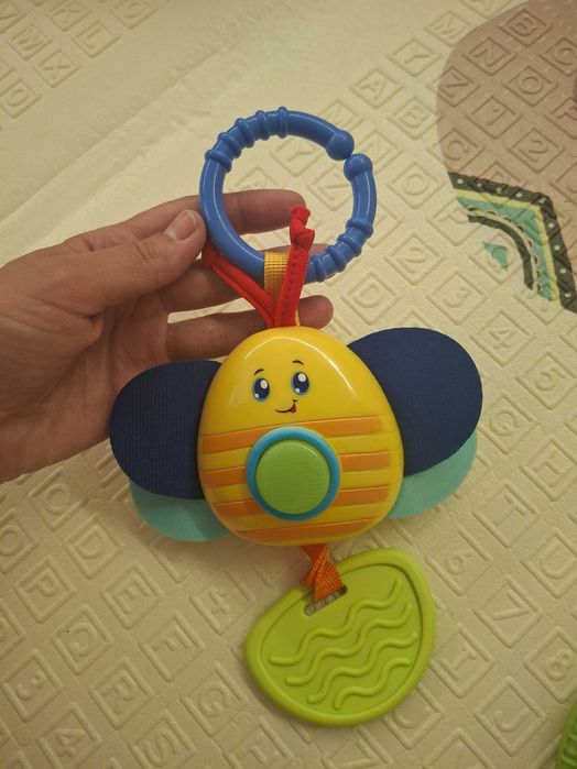 Брязкальця, іграшки на коляску для малюків