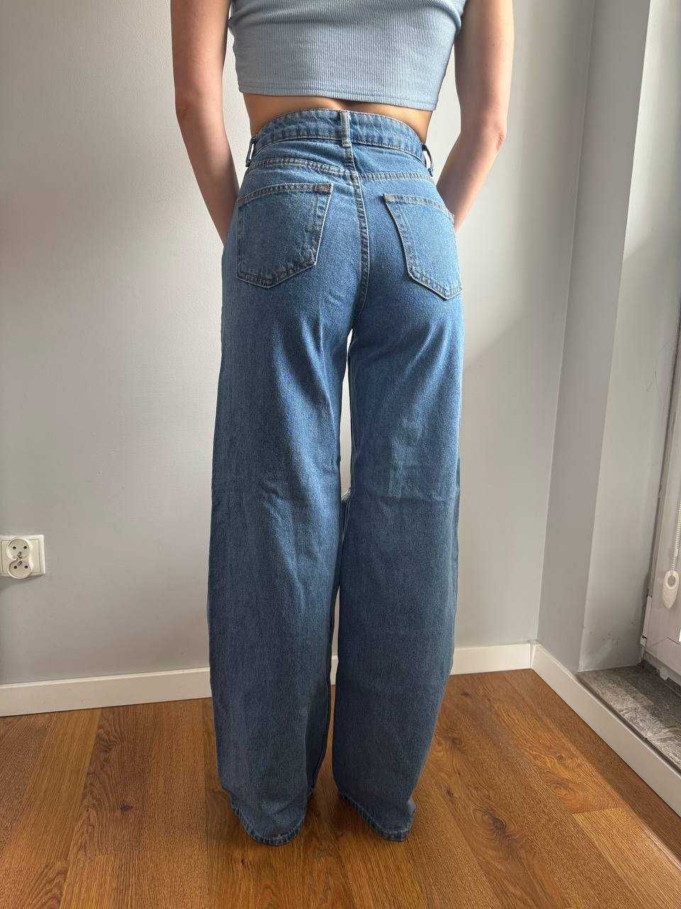 Damskie jeansy z dziurami