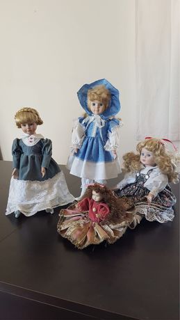 Conjunto de 4 bonecas de porcelana
