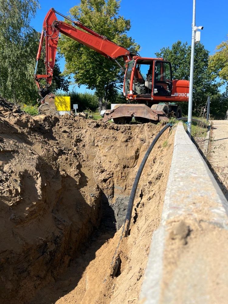 Wykopy, Prace ziemne, niwelacja terenu, koparka kołowa-usługi