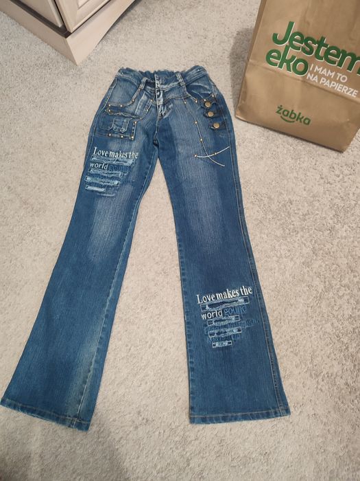 Джинси кльош, модні, нові