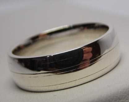 Srebrna obrączka delikatne paski dookoła  R.27. 7,6 mm.
