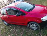 Volkswagen FOX 1.2 czerwony na pierwsze auto idealny