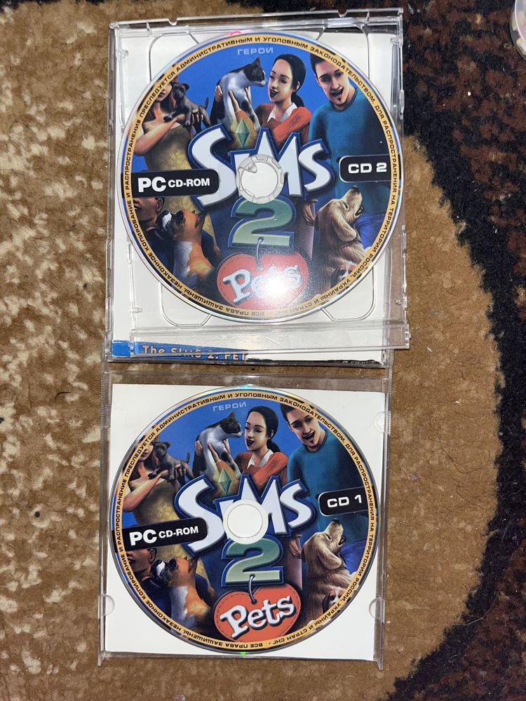Два диски з грою “the Sims 2 pets”