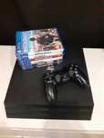 Playstation 4 Pro 1TB + 6 gier + pad