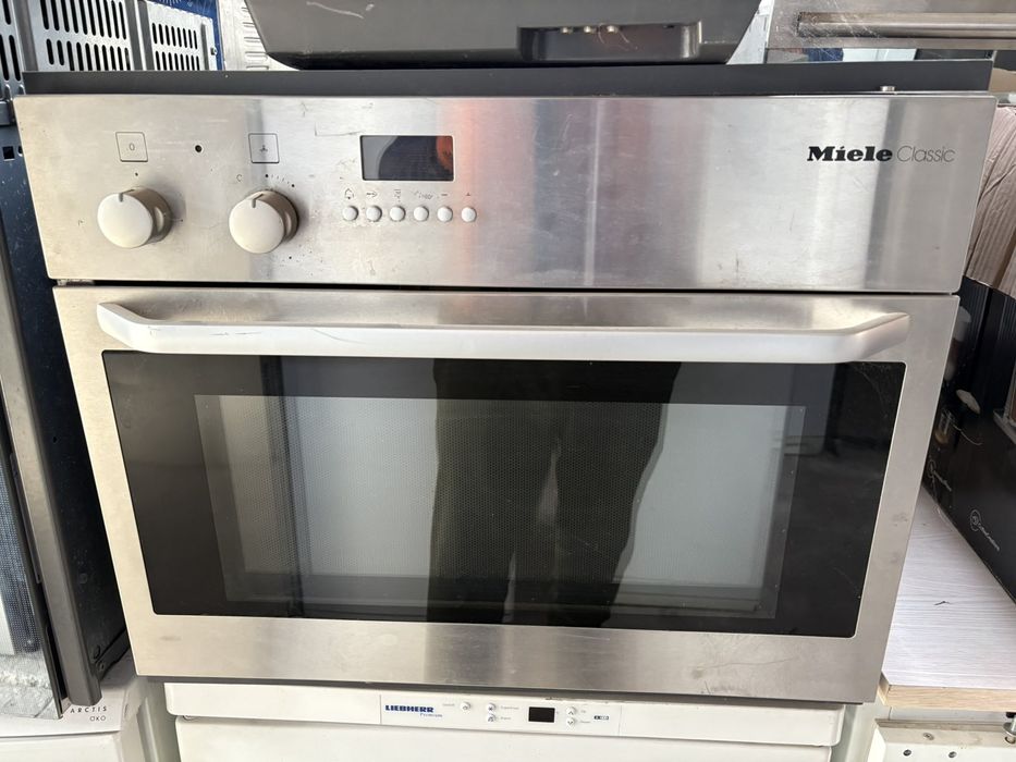 Микроволновка-духовка Miele  ( вбудована, електрична)( 021007 )