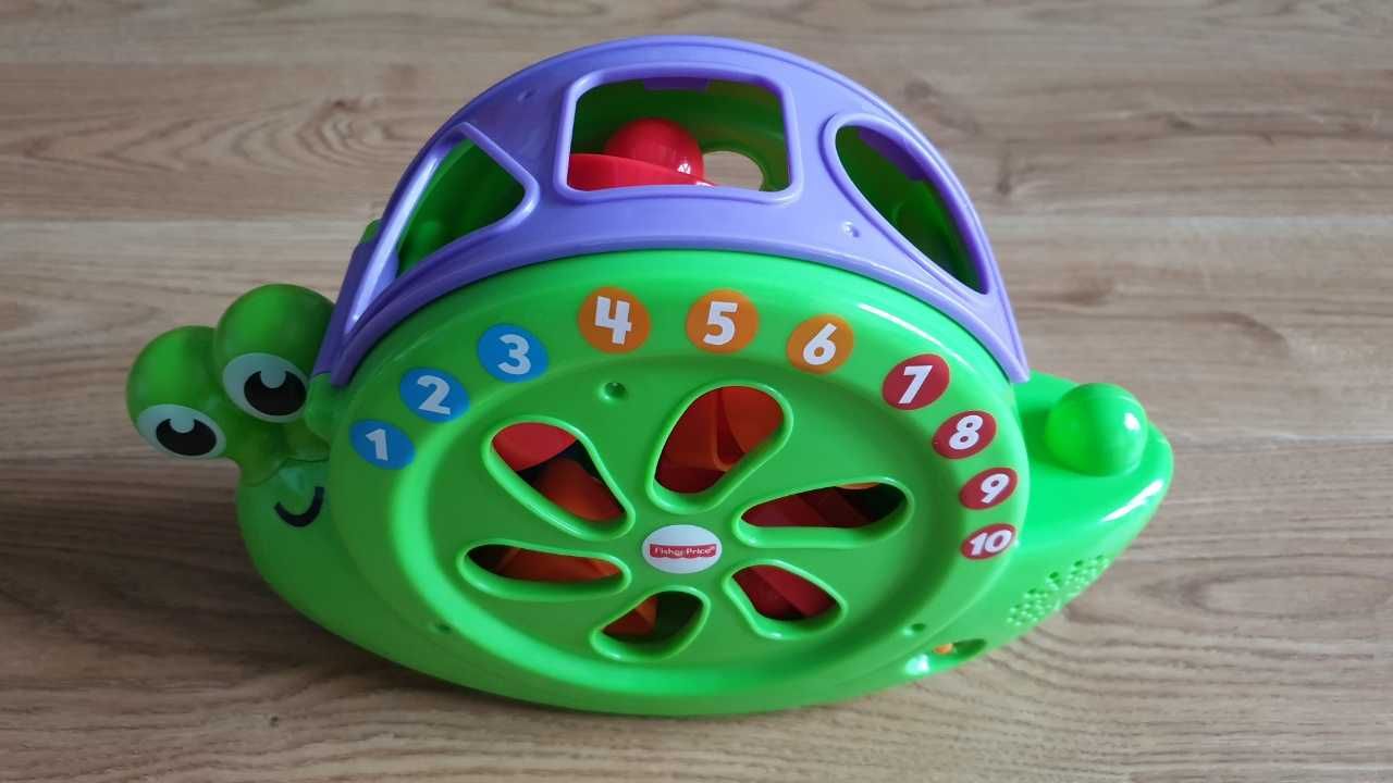 Interaktywny śpiewający ślimak marki Fisher Price - Sorter Kształtów