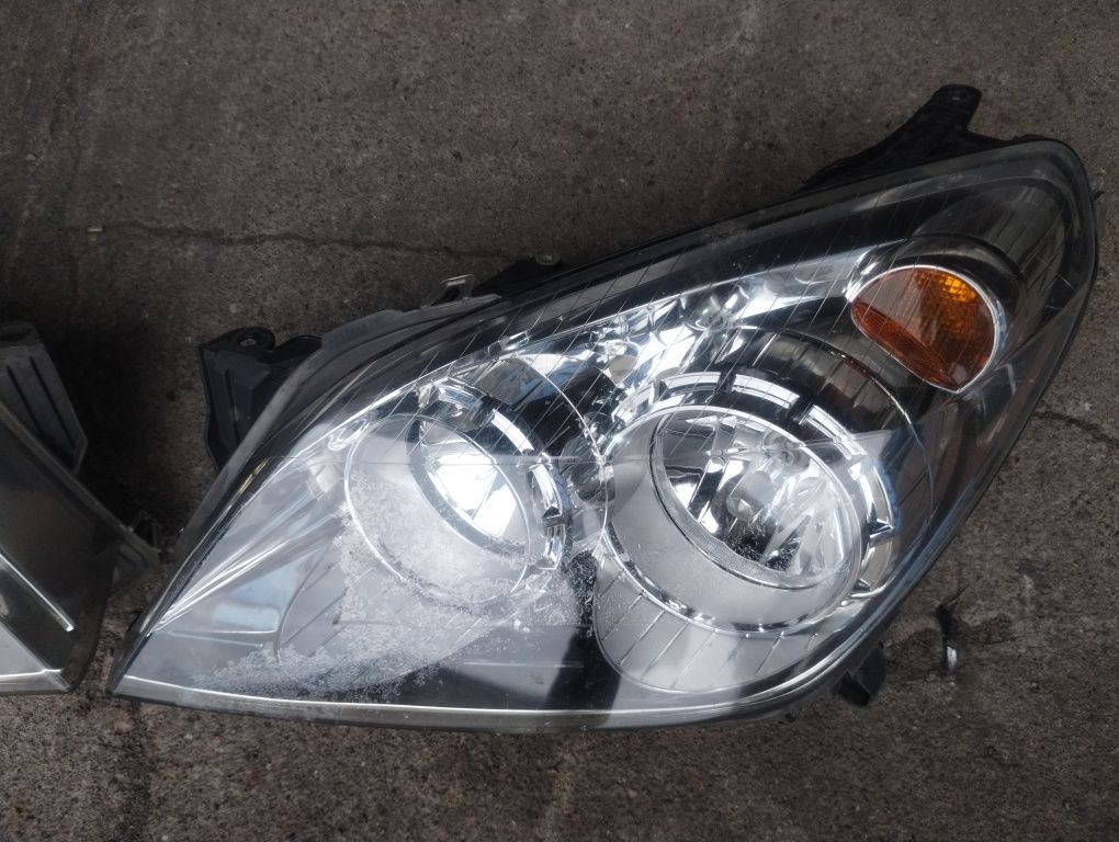 Opel Astra h III lampy  komplet przód lift