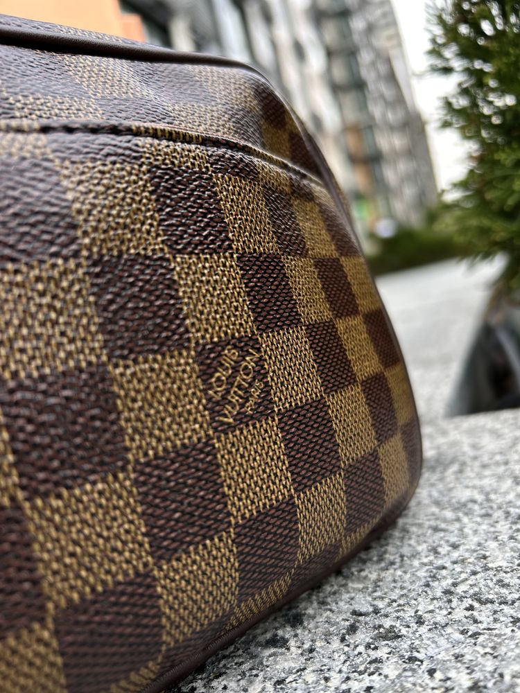 Клатч унісекс Louis Vuitton, який доповнить Ваш образ