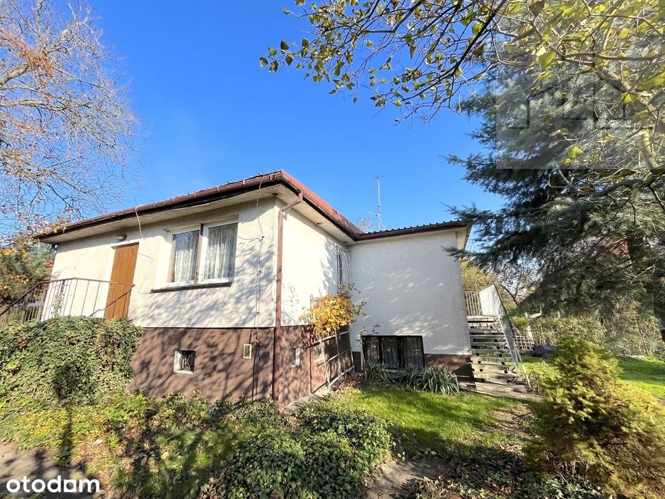 Przytulny i funkcjonalny dom z ogrodem i garażem!