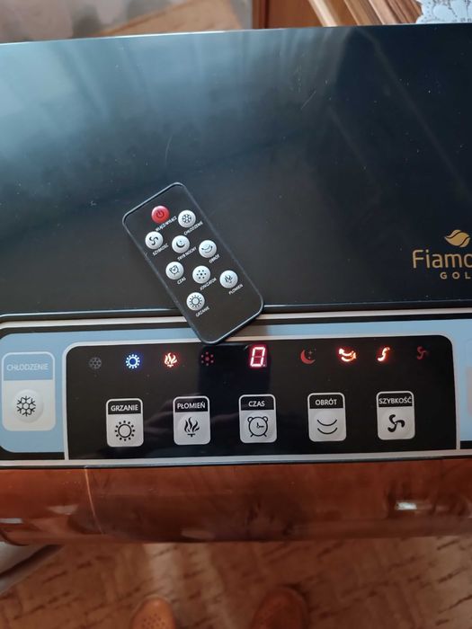 Przenośny grzejnik z funkcją kominka, klimatyzacji oraz jonizacji.