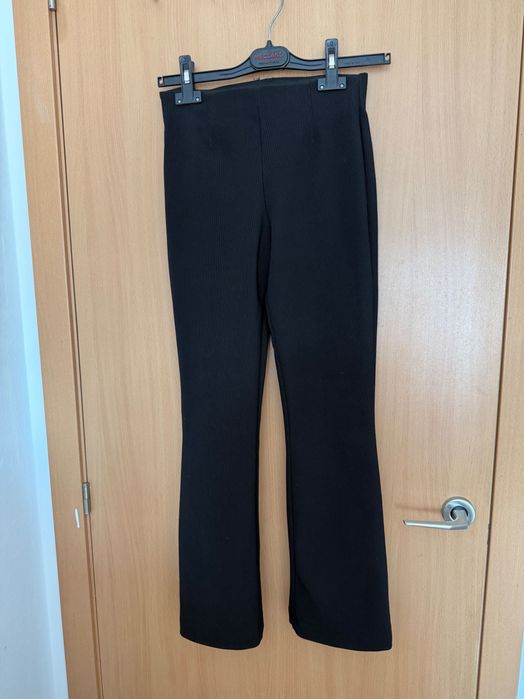 Calças boca de sino