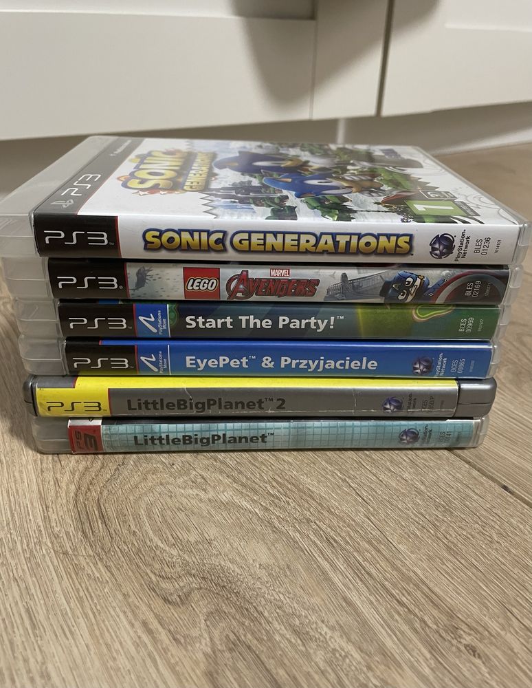 Konsola PS3 + 2 pady + kamerka + zestaw gier