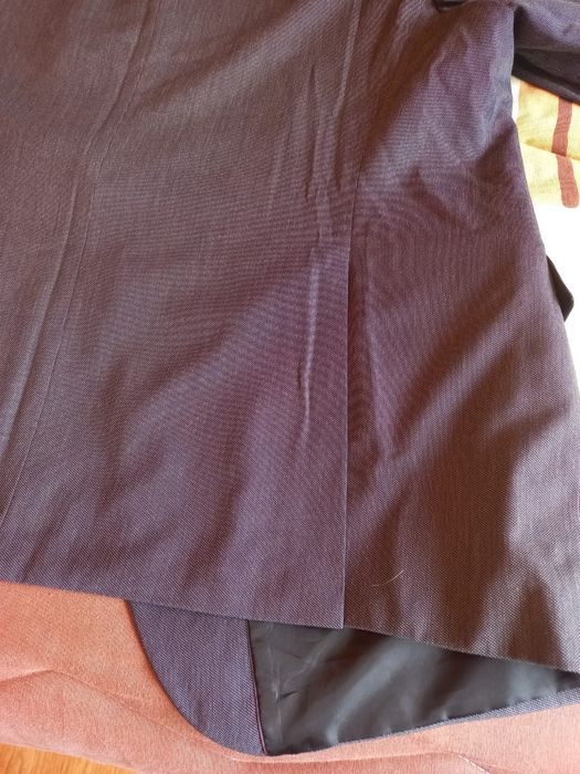 Casaco cinza  da parte do blazer