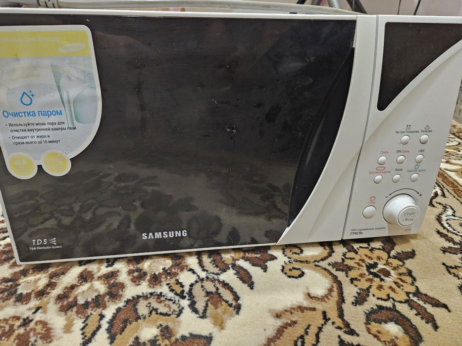 Мікрохвильова піч з грилем Samsung