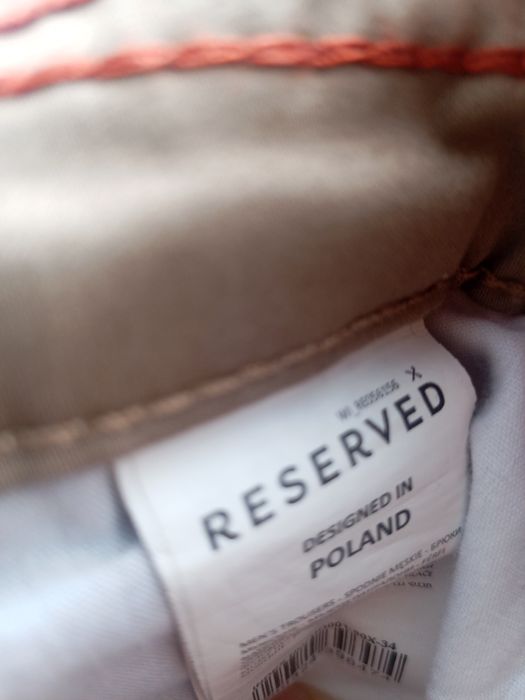 Spodnie męskie  beżowe bawełna. Reserved