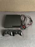 Sony playstation 3 slim + 2 джойстики + ігри