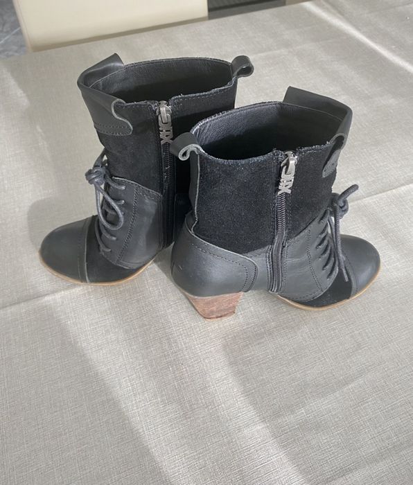 Botas xti em pele
