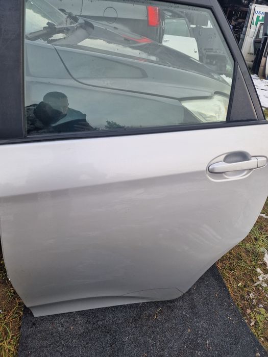 Drzwi lewe toyota verso s przód,tyl 1F7