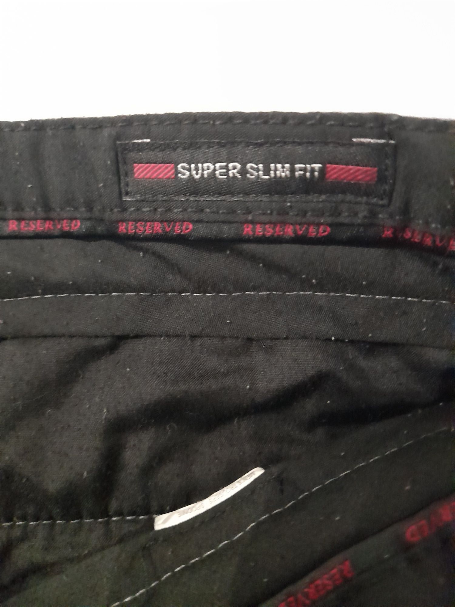Spodnie Reserved super slim fit