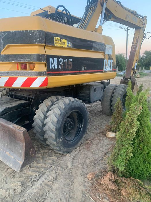 Koparka kołowa CAT M315 - 1996 rok - 15331 mh