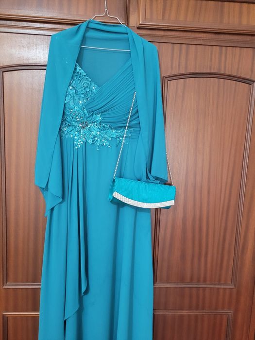 Vestido veste desde S ao M atras é elástico