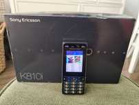 Sony Ericsson K810i + pudełko, ladowarka, słuchawki, smycz, dokumenty