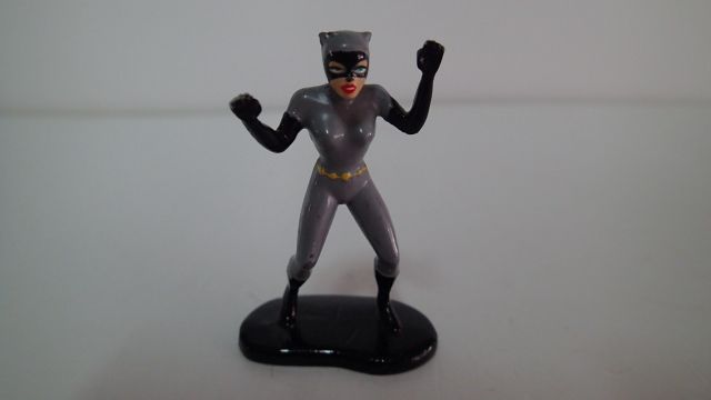 Boneco em chumbo "Batman" e "Batgirl"