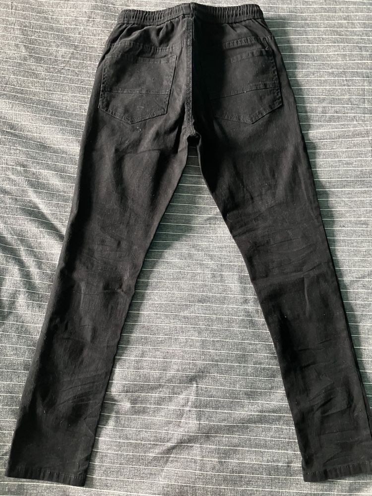 Spodnie chłopięce czarne jeansy Pepco 158cm