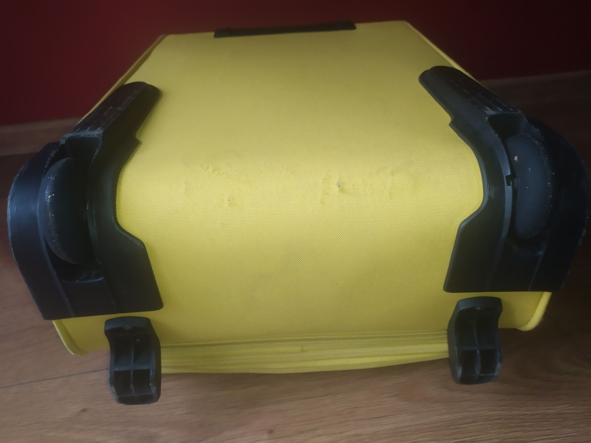 Żółta walizka kabinowa rozszerzana na 2 kółkach Samsonite 54x37x27cm