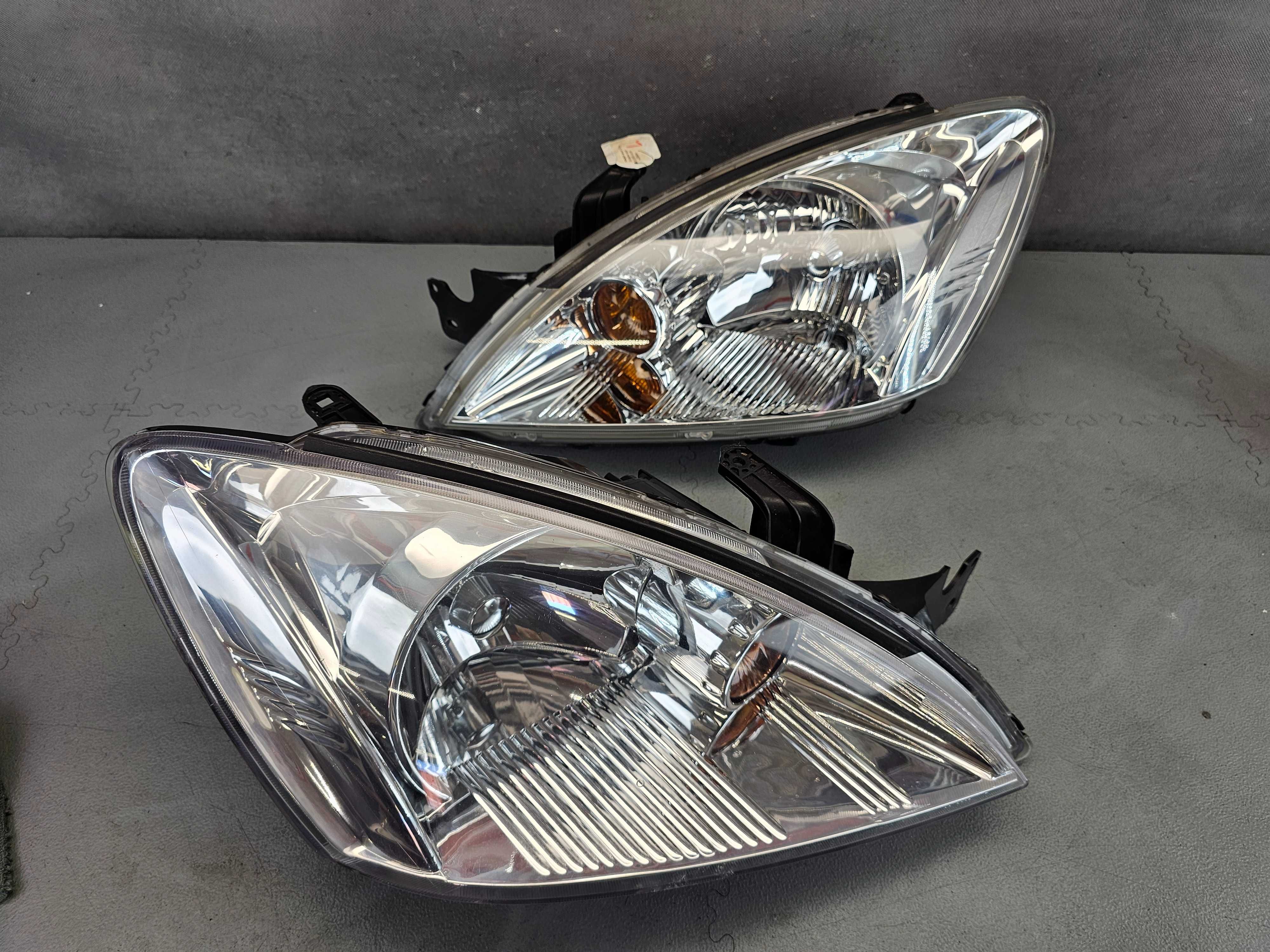 Mitsubishi Lancer 03-07r. Lampy Przód Przednie Lewa+Prawa Europa IGŁA