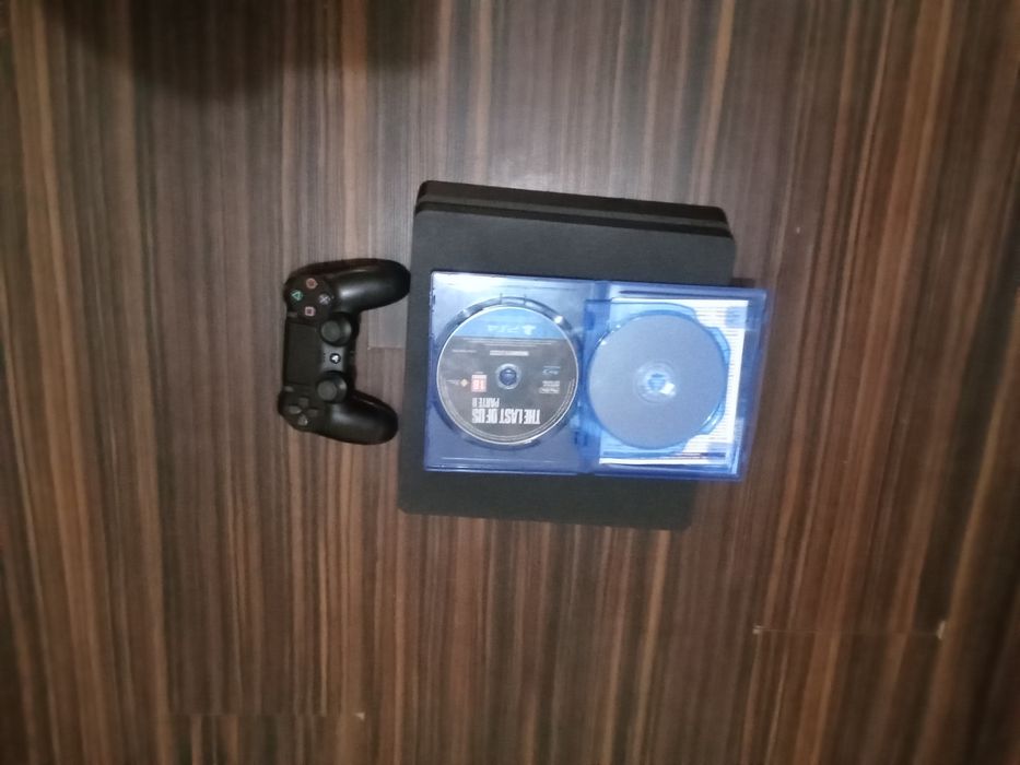 Ps4 Slim 500Gb+ TLOU Parte 2 físico+ Red Fead Redemption!