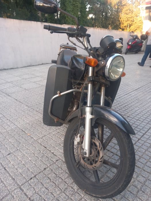Moto sym 125 toda se origem