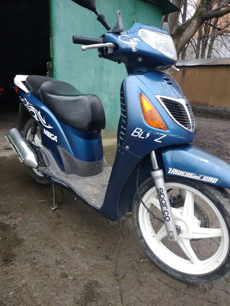Продам мопед скутер Honda sh 125