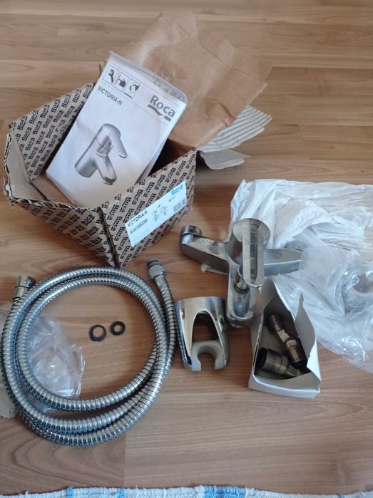 Torneira de banho com mangueira Roca