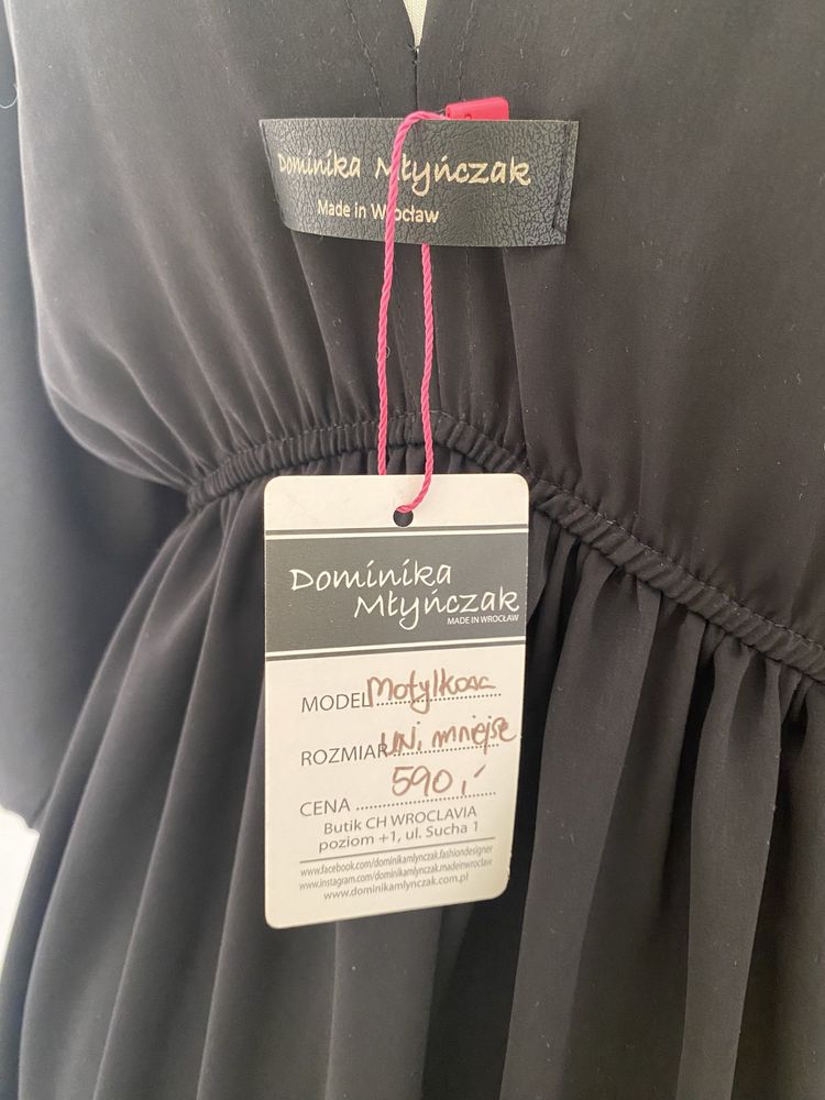 Lekka sukienka przed kolano w rozmiarze uni