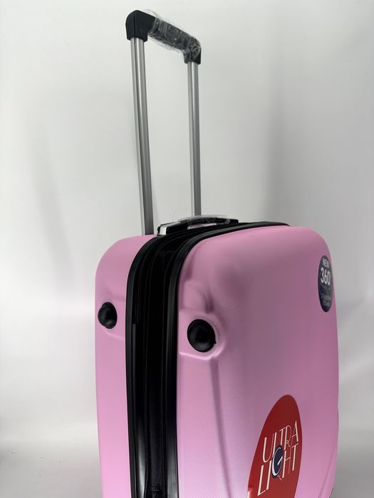 Nowa walizka średnia różowa, pudrowy róż